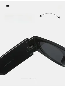 Detailed macro view of durable metal hinges and frame specs on black flat top sunglasses