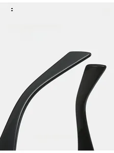 Macro view of glossy black curved temple arms on stylish square frame sunglasses