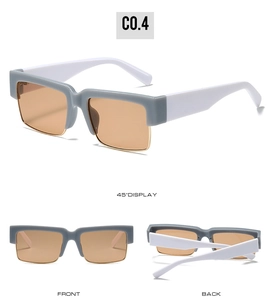Detail view of square blue and gold metal sunglasses with white temples and brown lenses