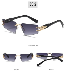 Frameless geometric sunglasses featuring gradient grey lenses and gold embossed metal hinges