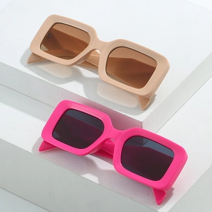 Retro wide-frame rectangular sunglasses in beige and hot pink colors for a stylish 90s look