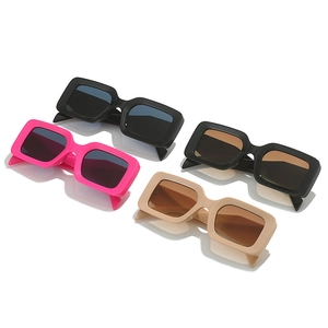 Stylish square frame sunglasses in black, beige, and pink colors with a minimalist retro design