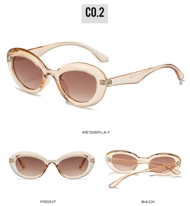 Vues détaillées de lunettes de soleil ovales vintage avec monture champagne et verres bruns