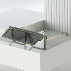 Futuristic polygon sunglasses with green double-layer flip lenses and gold metal temples