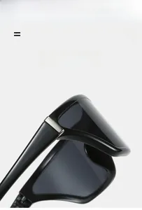 Detail view of the silver metallic rectangle accent on black Y2K cat-eye sunglasses hinge