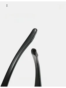 Detail of curved black glossy mirror legs for comfortable wear and Y2K futuristic style
