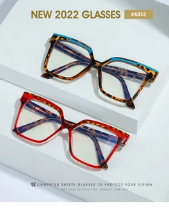 Detail of TR90 square frame glasses showing blue and red contrast color block design