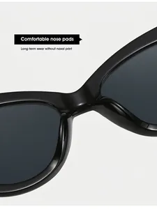 Makroaufnahme glatter integrierter Nasenpads an schwarzer Hochglanz-Cateye-Sonnenbrille