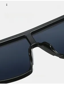 Detail of the integrated thick nose pads on oversized flat top black sunglasses