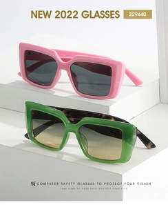 Detail of square oversized glasses frames with tortoiseshell temples on geometric display