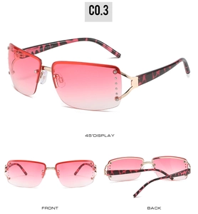 Detail view of rimless rectangle sunglasses with pink gradient lenses and rhinestone accents