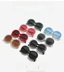 Detail of retro round sunglasses showing glitter frames in eight vibrant assorted colors