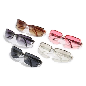 Five pairs of rimless Y2K sunglasses with gradient lenses and decorative metal studs