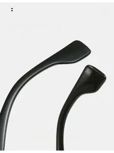 Macro view of curved glossy black sunglasses legs with ergonomic arc for comfort