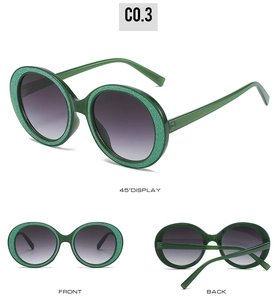Green glitter round sunglasses with oversized frame and dark grey gradient lenses