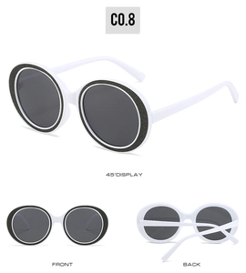 Three perspectives of white round sunglasses with glitter accents and dark lenses