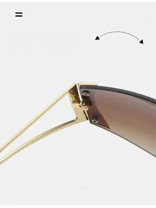 Detail of durable gold metal hinge on Y2K rimless sunglasses with gradient lenses