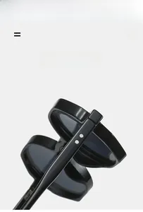 Detail of lightweight polygon sunglasses showing metal rivets and flexible hinge connection