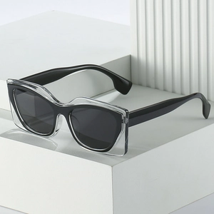 Chic cat eye sunglasses with double-layered transparent frame on white platform