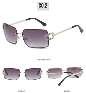 Detailed macro view of rimless rectangular sunglasses with rhinestone chain temples