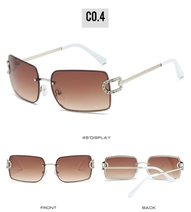 Detail view of rimless square Y2K sunglasses with brown gradient lenses and crystal accents