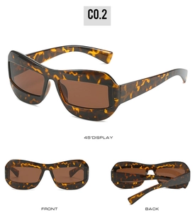 Detailed views of tortoise shell sunglasses featuring wide frames and brown lenses