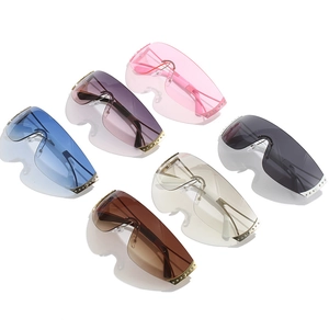 Frameless Y2K sports sunglasses in six vibrant colors with decorative metal studs