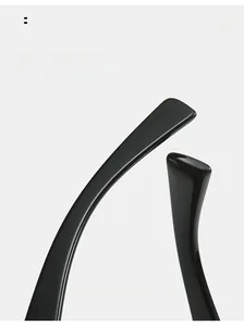 Detailed view of glossy black curved ergonomic temple arms for comfortable fit sunglasses