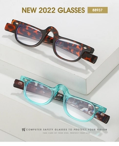 Detail of tortoise shell and translucent blue PC optical frames on a white stone stand