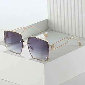 Square oversized sunglasses with purple gradient lenses and geometric gold metal frames