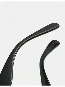 Detailed view of the ergonomic curved black mirror legs for comfortable sunglasses wear