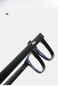 Detail of ultra-light elastic black PC eyeglass frames with silver metallic temple accents