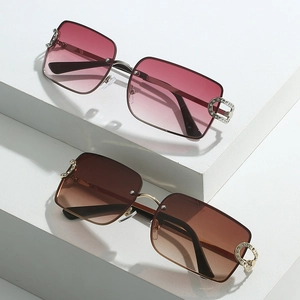 Frameless Y2K square sunglasses with rhinestone C-detail and gradient lenses