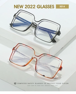 Detail view of square blue light blocking glasses in gradient grey and tortoise patterns
