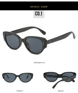 Three-angle view of black cat-eye sunglasses with metal dot rivets and grey lenses