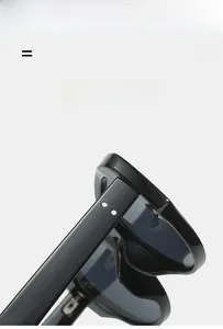 Detailed close-up of premium temple hinge and decorative metal dots on black sunglasses