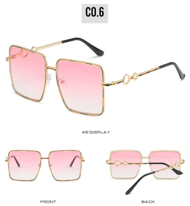 Detailed multi-angle view of oversized square sunglasses with gold metal frame and pink lenses