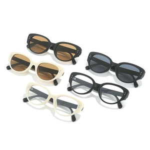 Retro cat-eye sunglasses with rice nail accents and colored lenses in assorted frame styles