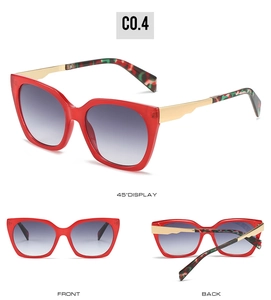 Detail view of square red sunglasses with camo temple tips and grey gradient lenses