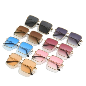 Oversized square sunglasses with gold metal frames and various gradient tinted lenses