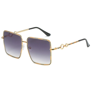 Oversized square sunglasses with golden metal frame and gradient purple lenses