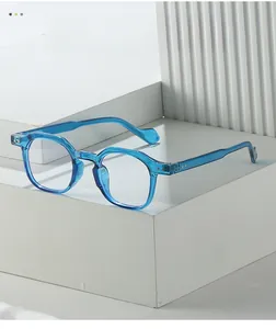 Macro shot of stylish blue transparent geometric frames on architectural white blocks