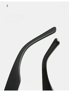 Detail of curved ergonomic temple arms on square black resin sunglasses for comfort