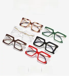 Detailed grid of oversized square eyeglass frames in six diverse colors and textures