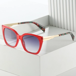 Chic oversized square sunglasses with red frames and gold leopard print temples