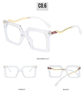 Three-way view of square blue light glasses with wavy gold temples and clear frames