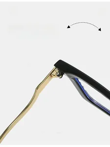Detailed macro view of durable gold metal hinges on oversized black square glasses
