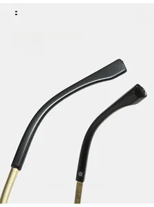 Detail of metal and acetate temple arms with curved black tips for comfortable wear