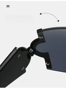 Détail macro de la charnière métallique durable sur lunettes de soleil Y2K à verres gris