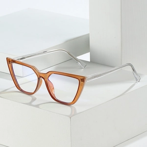 Retro cat-eye blue light blocking glasses with amber frames and transparent temples